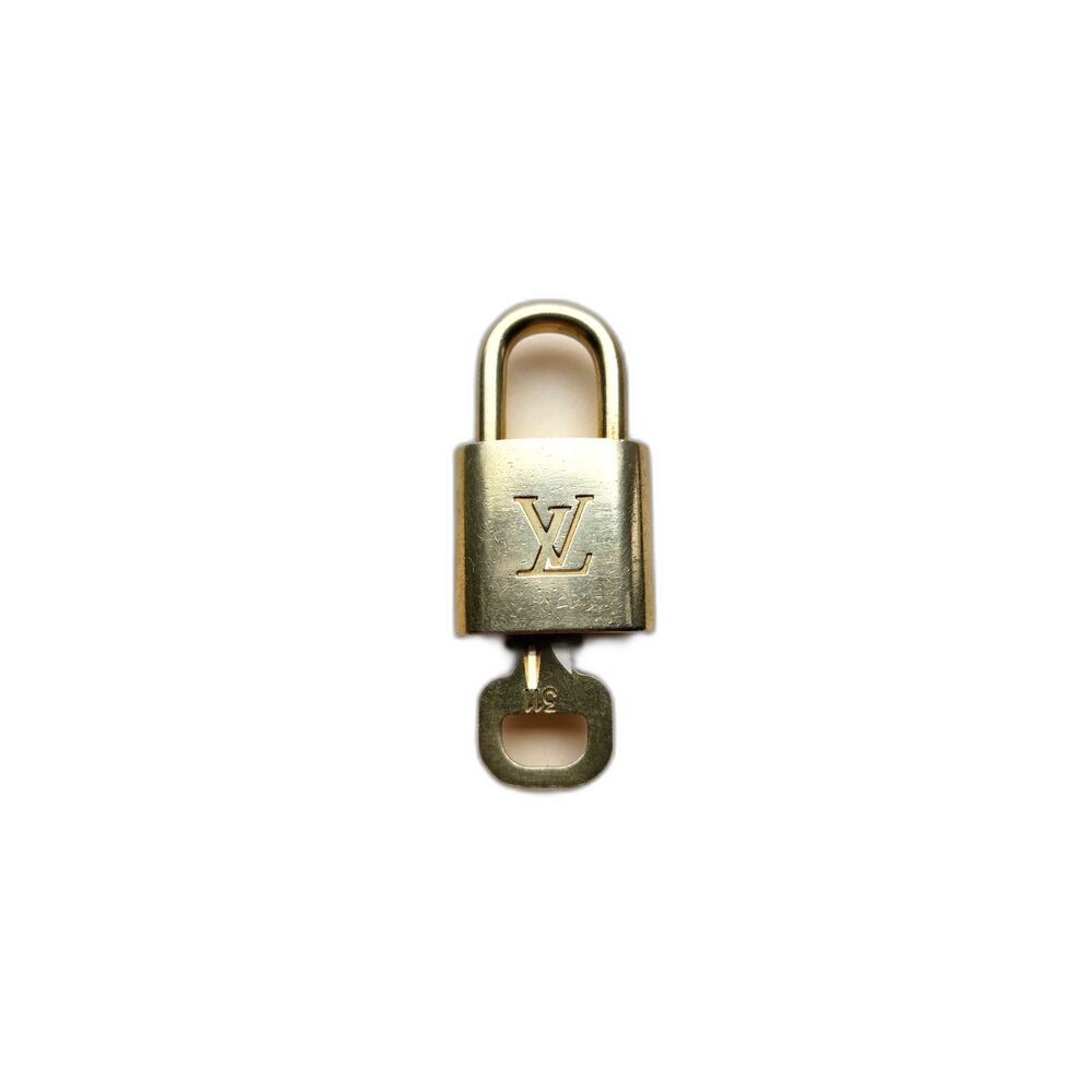 Authentic Louis Vuitton Lock and Key Set. Vintage LV bag accessory